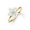 Greenwich ring featuring five 4 mm faceted round cut white topaz and one 2.1 mm diamond prong set in 14k gold - angled view