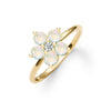 Greenwich ring featuring five 4 mm faceted round cut opals and one 2.1 mm diamond prong set in 14k gold - angled view