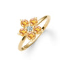 Greenwich ring featuring five 4 mm faceted round cut citrines and one 2.1 mm diamond prong set in 14k gold - angled view