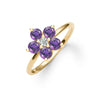 Greenwich ring featuring five 4 mm faceted round cut amethysts and one 2.1 mm diamond prong set in 14k gold - angled view