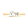 Greenwich ring featuring one 4 mm faceted round cut white topaz and one 2.1 mm diamond prong set in 14k gold - front view