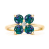 Greenwich ring featuring four 4 mm faceted round cut alexandrites and one 2.1 mm diamond prong set in 14k gold - front view