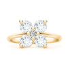 Greenwich ring featuring four 4 mm faceted round cut white topaz and one 2.1 mm diamond prong set in 14k gold - front view