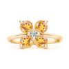 Greenwich ring featuring four 4 mm faceted round cut citrines and one 2.1 mm diamond prong set in 14k gold - front view