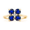 Greenwich ring featuring four 4 mm faceted round cut sapphires and one 2.1 mm diamond prong set in 14k gold - front view