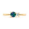 Greenwich ring featuring one 4 mm faceted round cut alexandrite and one 2.1 mm diamond prong set in 14k gold - front view