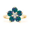Greenwich ring featuring five 4 mm faceted round cut alexandrites and one 2.1 mm diamond prong set in 14k gold - front view