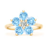 Greenwich ring featuring five 4 mm round cut Nantucket blue topaz and one 2.1 mm diamond prong set in 14k gold - front view
