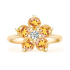 Greenwich ring featuring five 4 mm faceted round cut citrines and one 2.1 mm diamond prong set in 14k gold - front view
