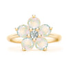 Greenwich ring featuring five 4 mm faceted round cut opals and one 2.1 mm diamond prong set in 14k gold - front view