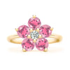 Greenwich ring featuring five 4 mm faceted round pink tourmalines and one 2.1 mm diamond prong set in 14k gold - front view