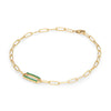 14k yellow gold Adelaide paperclip chain bracelet featuring one link encrusted with 1.5 mm pavé emeralds - angled view
