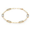 14k yellow gold Adelaide paperclip chain bracelet featuring five links encrusted with 1.5 mm pavé alexandrites - angled view