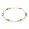 14k yellow gold Adelaide paperclip chain bracelet featuring five links encrusted with 1.5 mm pavé emeralds - angled view