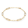 14k yellow gold Adelaide paperclip chain bracelet featuring five links encrusted with 1.5 mm pavé white topaz - angled view