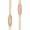 Pair of 14k yellow gold Adelaide paperclip chain pavé necklaces each featuring one pink sapphire-encrusted link