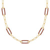 14k yellow gold Adelaide paperclip chain necklace featuring five links encrusted with 1.5 mm pavé garnets - front view