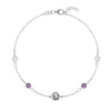 Joy Over Everything white gold bracelet featuring 4 birthstones and a 1/4” flat disc engraved with the BLH foundation logo