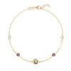 Joy Over Everything 14k gold bracelet featuring 4 birthstones and a 1/4” flat disc engraved with the BLH foundation logo