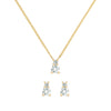 Pair of Greenwich earrings and a necklace in 14k gold featuring 4 mm white topaz and 2.1 mm diamonds - front view