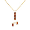Providence 3 Garnet pendant and stud earrings set with petite baguette stones set in 14k yellow gold - front view
