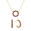 Rosecliff small open circle necklace and huggie earrings featuring 2 mm round cut garnets prong set in 14k gold - front view