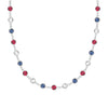 Liberty Newport necklace featuring alternating 4 mm briolette white topaz, sapphires and rubies bezel set in 14k white gold