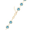 14k yellow gold 1.17 mm cable chain with a lobster claw clasp and 6 mm briolette cut bezel set Nantucket blue topaz