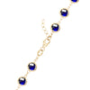 14k yellow gold 1.17 mm cable chain with a lobster claw clasp and 6 mm briolette cut bezel set sapphires
