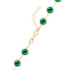 14k yellow gold 1.17 mm cable chain with a lobster claw clasp and 6 mm briolette cut bezel set emeralds