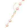 14k yellow gold 1.17 mm cable chain with a lobster claw clasp and 6 mm briolette cut bezel set pink opals
