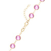 14k yellow gold 1.17 mm cable chain with a lobster claw clasp and 6 mm briolette cut bezel set pink sapphires