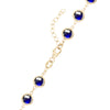 14k yellow gold 1.17 mm cable chain with a lobster claw clasp and 6 mm briolette cut bezel set sapphires