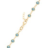 14k yellow gold 1.17 mm cable chain with a lobster claw clasp and 4 mm briolette cut bezel set Nantucket blue topaz