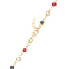 14k yellow gold 1.17 mm cable chain with a lobster claw clasp and alternating 4 mm white topaz, sapphires and rubies