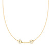 14k yellow gold cable chain necklace featuring two 1/4” flat engraved letter discs, spelling XO - front view