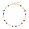 Liberty Newport 14k gold bracelet featuring eighteen alternating 4 mm white topaz, sapphires and rubies - front view