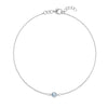Classic cable chain bracelet featuring one 4 mm briolette cut aquamarine bezel set in 14k white gold