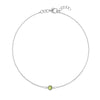 Classic cable chain bracelet featuring one 4 mm briolette cut peridot bezel set in 14k white gold