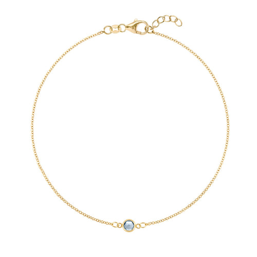 Classic cable chain bracelet featuring one 4 mm briolette cut aquamarine bezel set in 14k yellow gold - front view