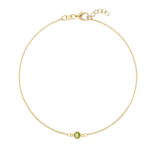 Classic cable chain bracelet featuring one 4 mm briolette cut peridot bezel set in 14k yellow gold - front view
