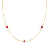 Bayberry 1.17 mm cable chain birthstone necklace featuring three 4 mm briolette rubies bezel set in 14k gold - front view