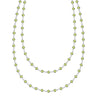 Newport Wrap necklace featuring 4 mm briolette cut peridots bezel set in 14k white gold