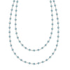 Newport Wrap necklace featuring 4 mm briolette cut Nantucket blue topaz bezel set in 14k white gold