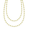 Newport Wrap necklace featuring 4 mm briolette cut peridots bezel set in 14k yellow gold - front view