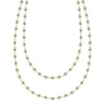 Newport Wrap necklace featuring 4 mm briolette cut Nantucket blue topaz bezel set in 14k yellow gold - front view