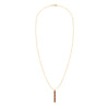 Providence vertical bar pendant necklace featuring 6 petite Garnet baguette stones set in 14k yellow gold