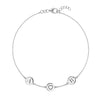 14k white gold Classic bracelet featuring three 1/4” flat discs, one engraved with a heart symbol, two with the letters A & B