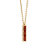 Providence Garnet vertical bar pendant featuring 3 petite baguette stones set in 14k yellow gold - angled view