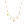 Providence 5 White Topaz drop necklace with petite baguette cut stones set in 14k yellow gold - angled view